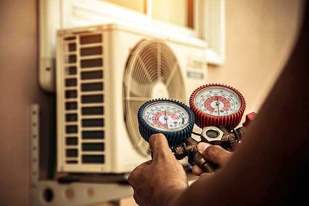 Professional Air Conditioning Service technician working in Witmer, PA